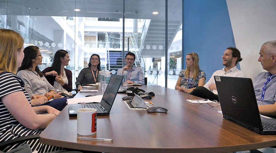 A group of HL workers in a group session