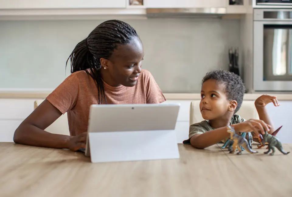 A mother and son playing