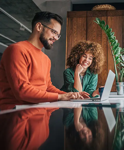 Man looking at laptop screen