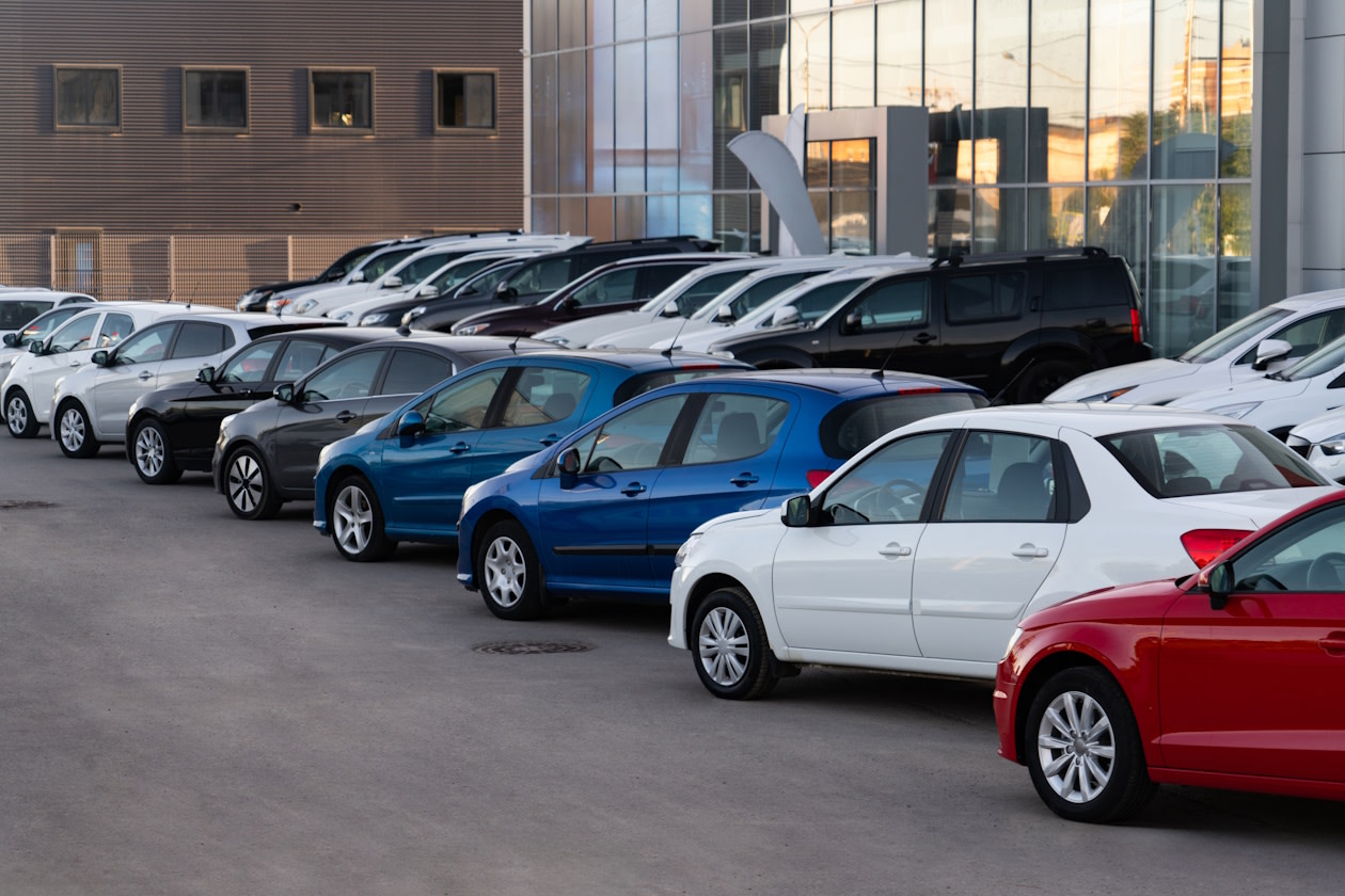 Image of cars parked at a dealership.jpg