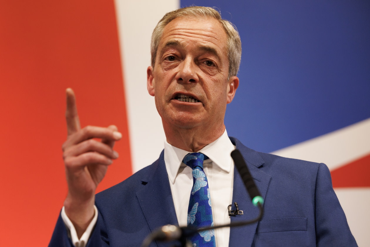 Nigel Farage standing in front of union jack.jpg