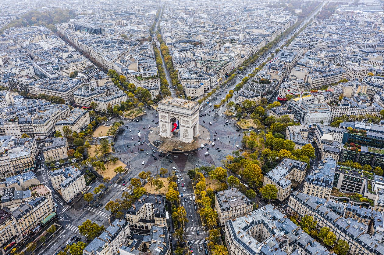 Aerial view of The Arc De Triomphe roundabout in Paris France.jpg