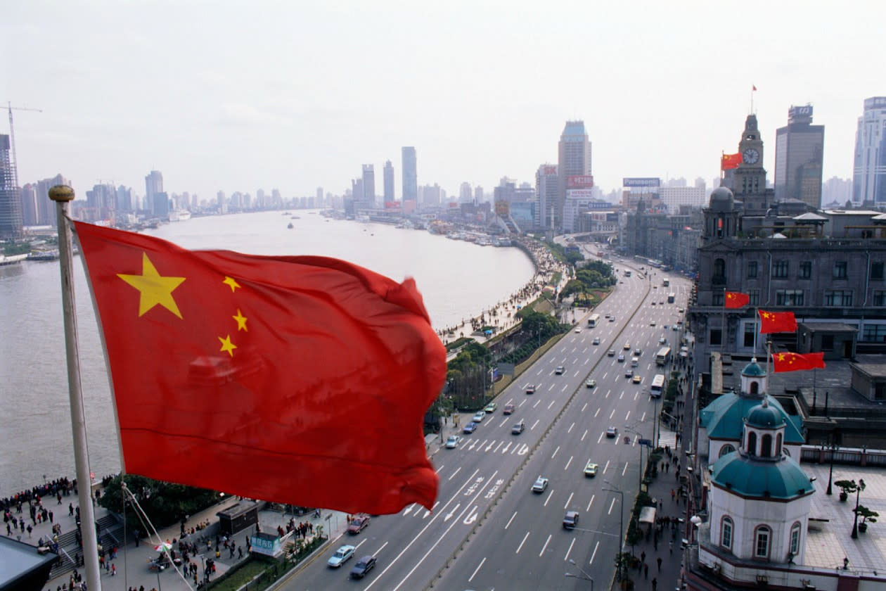 Chinese flag flying outside The Bund in Shanghai