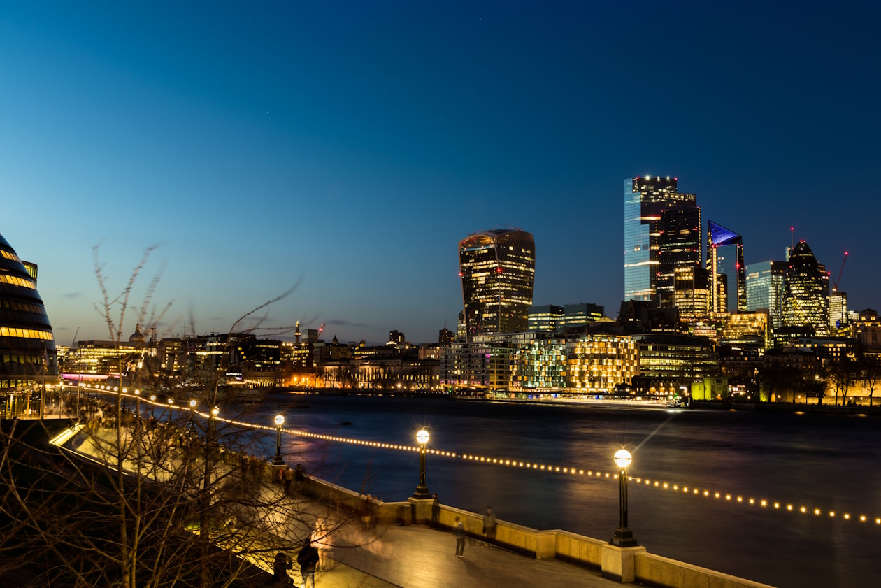 View of London at night from the Thames