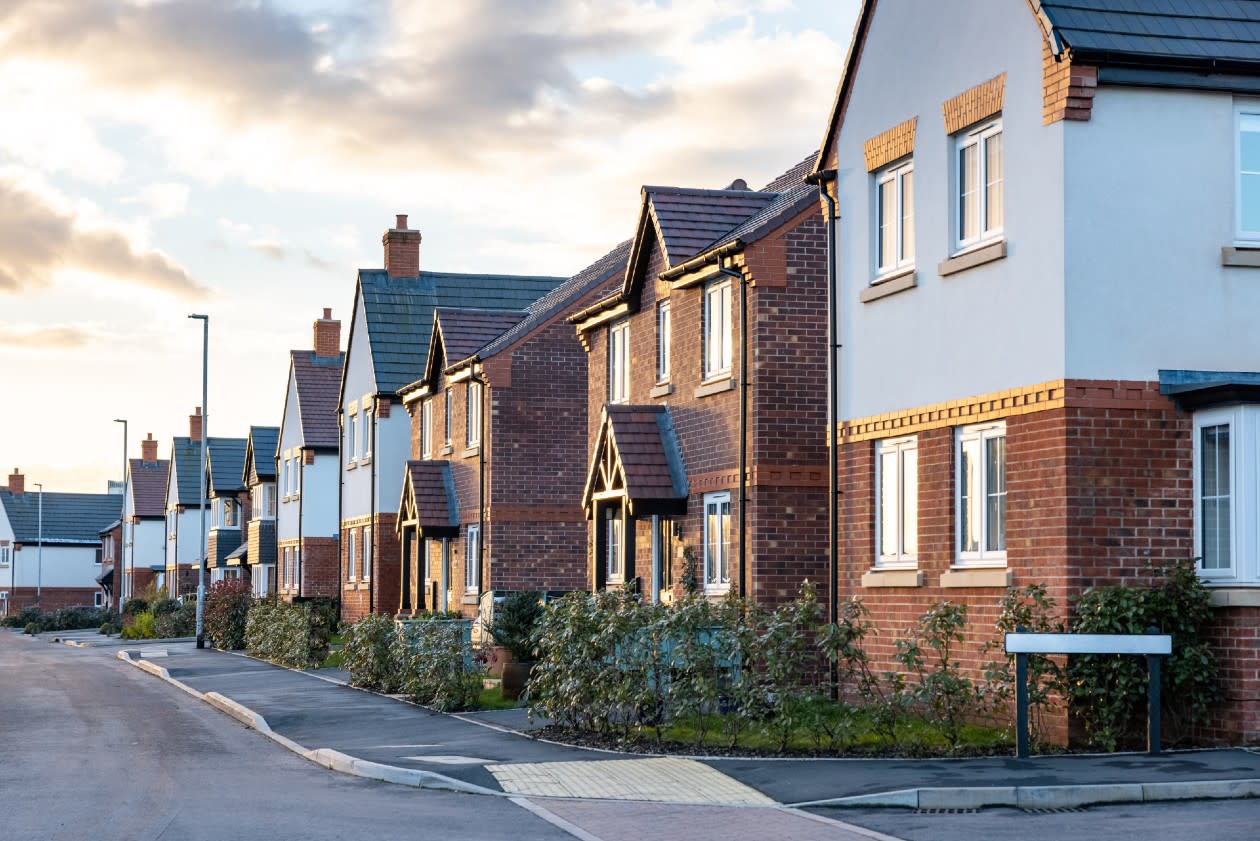 New build houses on a UK residential street.jpg