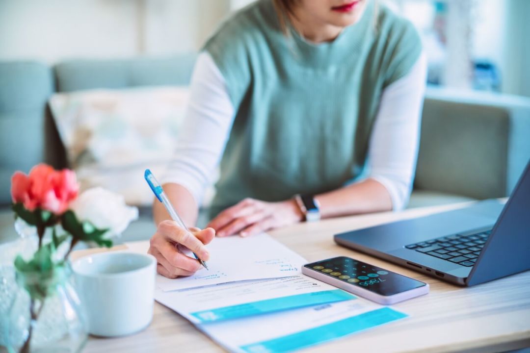 Woman going through her bills and taxes.jpg