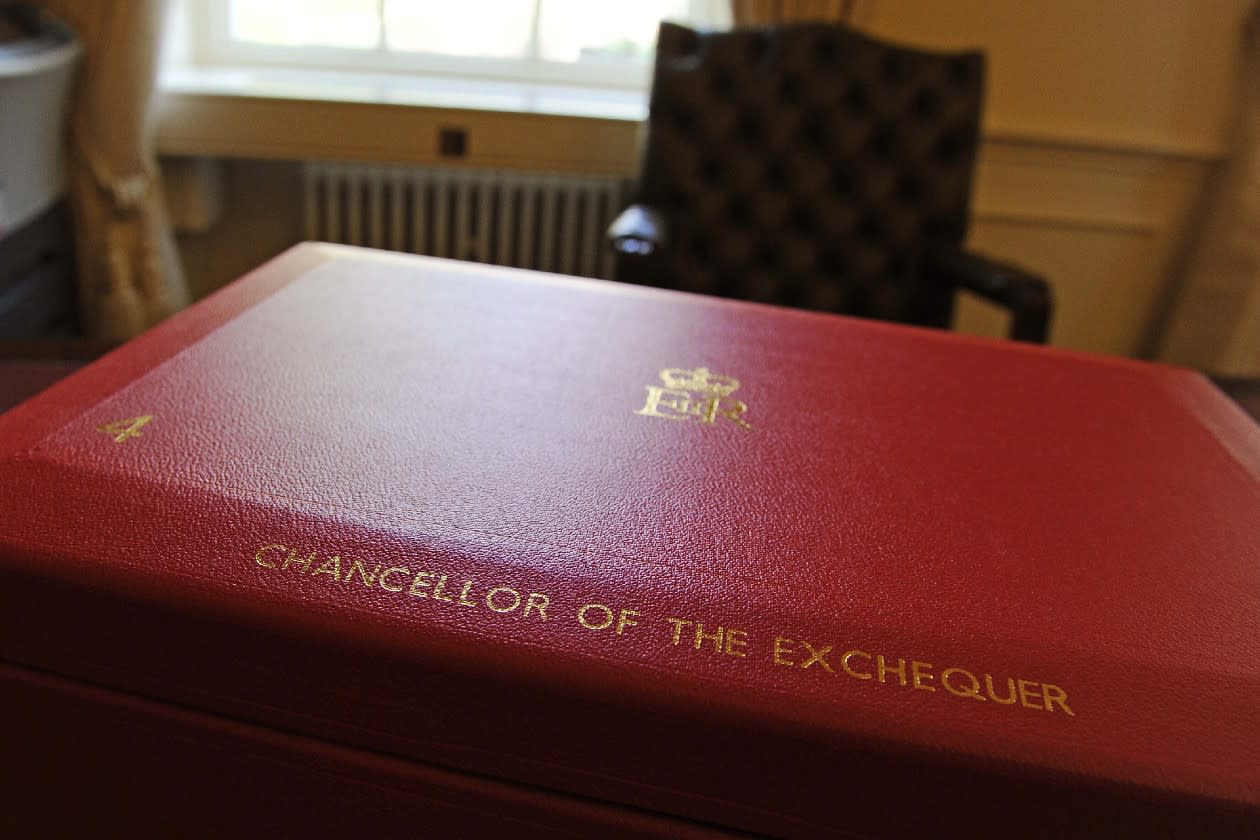 Budget 2024 - chancellors red briefcase in front of a chair