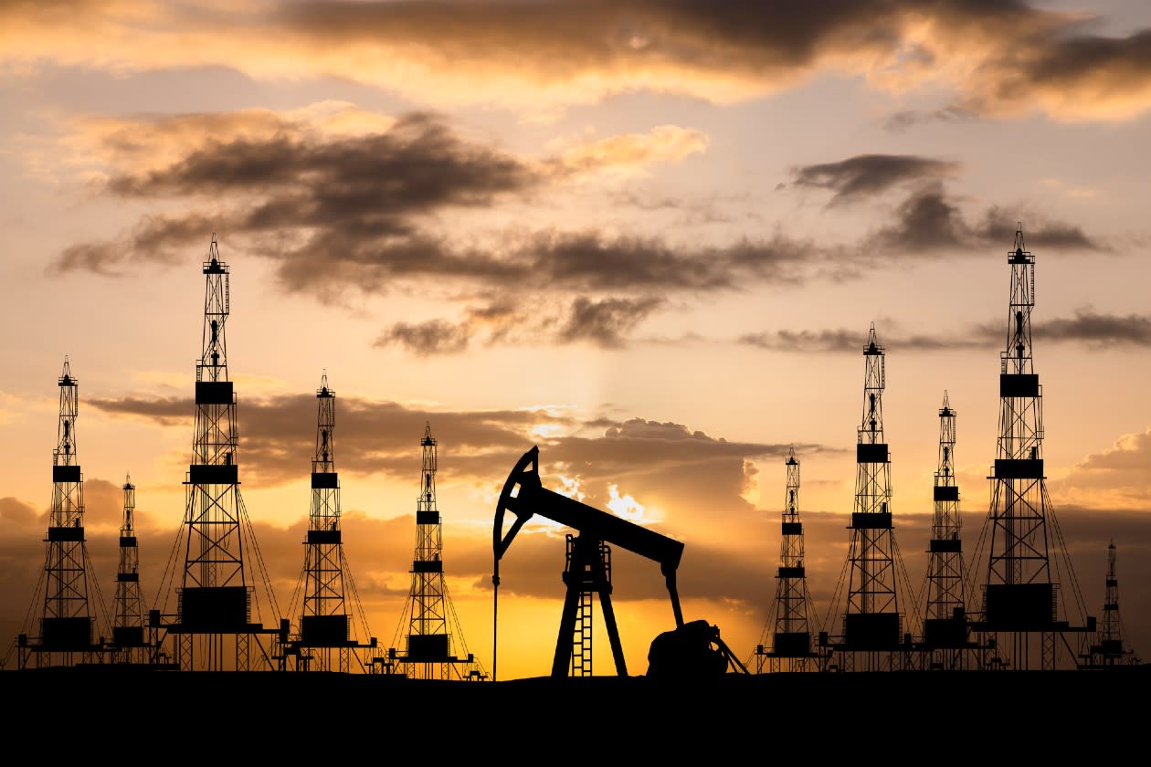 Sunset landscape of US oil drilling equipment.jpg