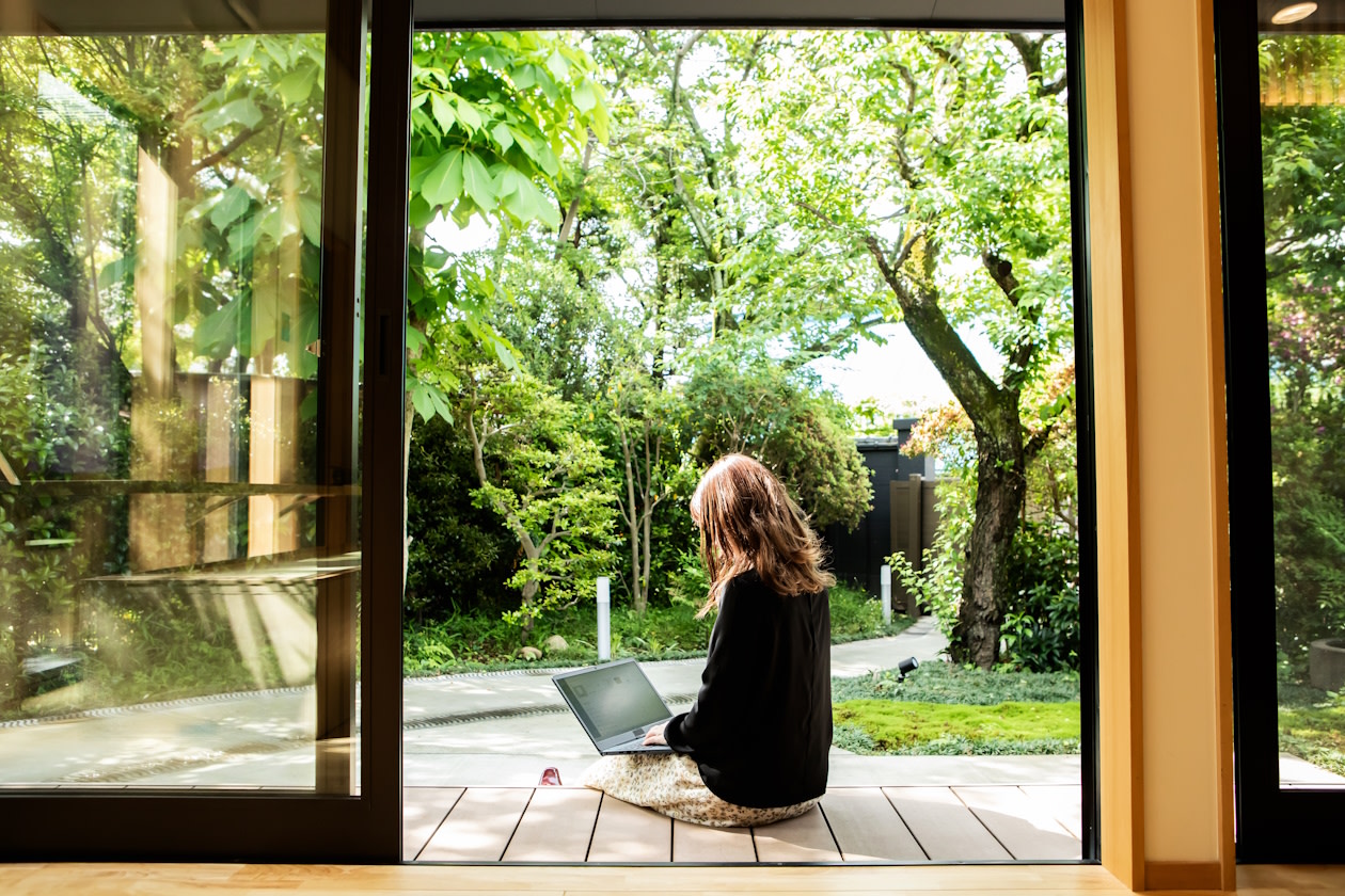 Woman on her laptop in the garden.jpg
