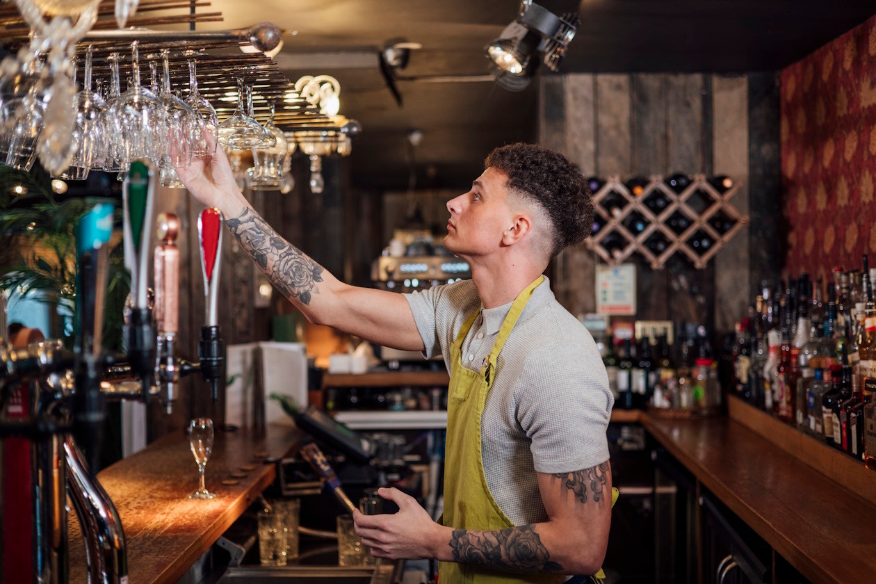Bartender in JD Wetherspoons pub