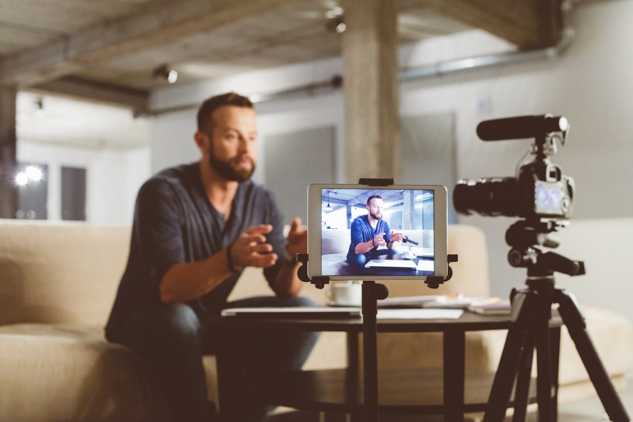 Finance influencer talking to camera  
