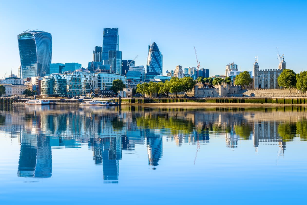 View across the Thames of Londons financial district with reflection on the water.jpg