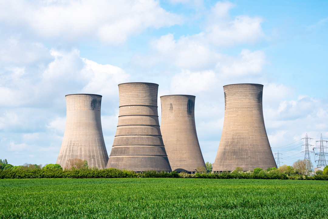Nuclear power plants in front of a field of grass.jpg