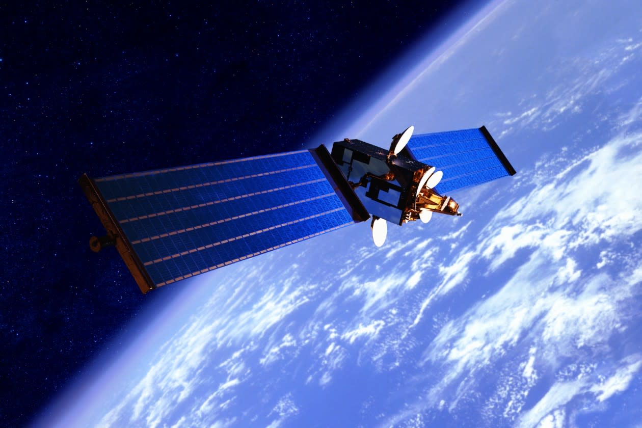 Communications satellite orbiting earth.jpg