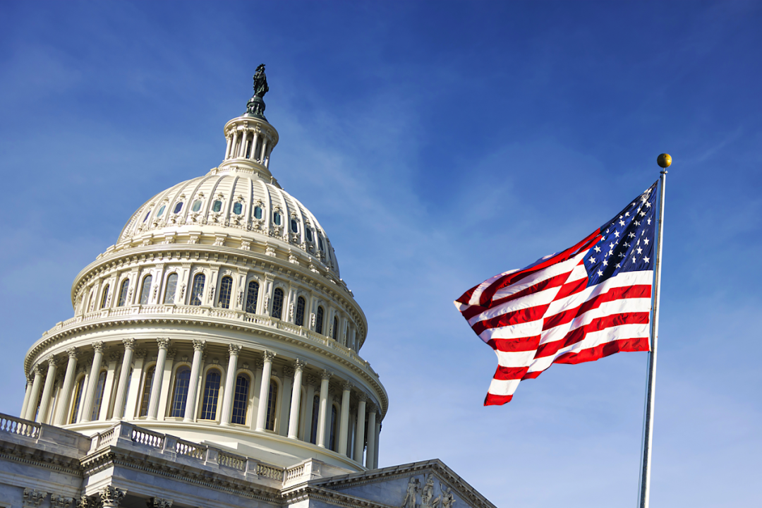 American flag waving with the Capitol Hill.png