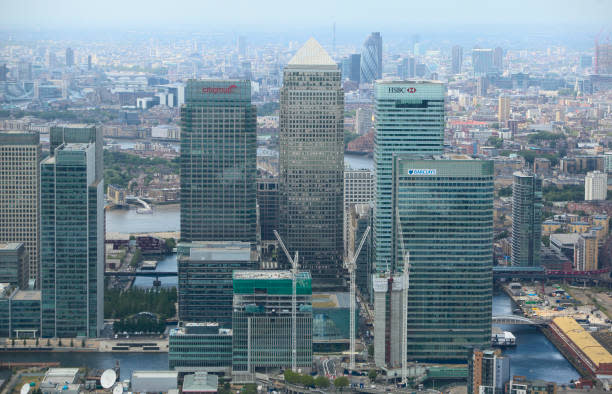 Aerial view of Canary Wharf with the City of London in the background