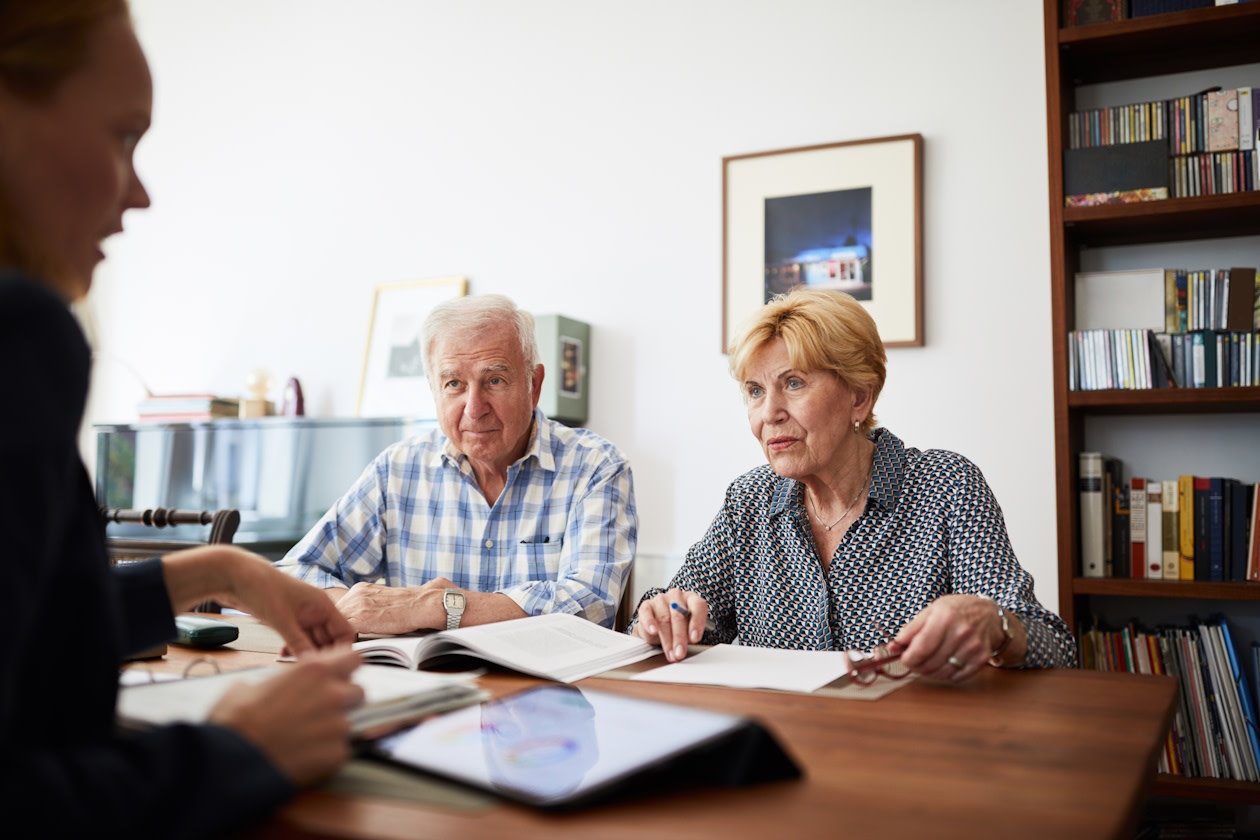 Older couple meeting with a pension advisor