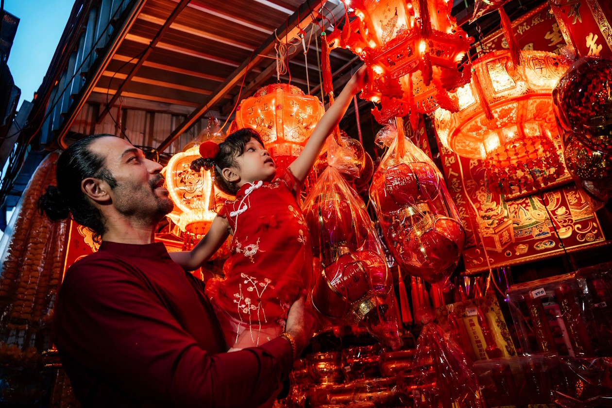 Father and daughter looking at Chinese lantern.jpg