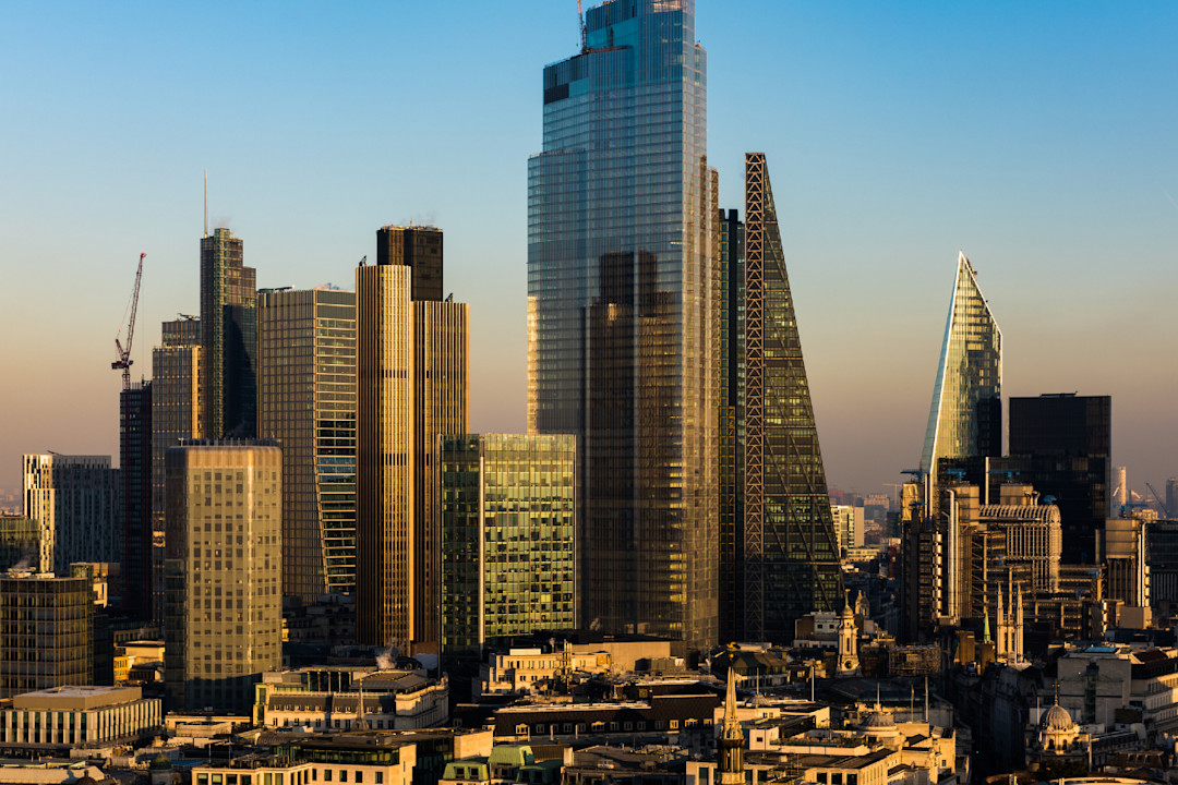 Elevated View of The City of London-s Illuminated Financial District Skyline.jpg