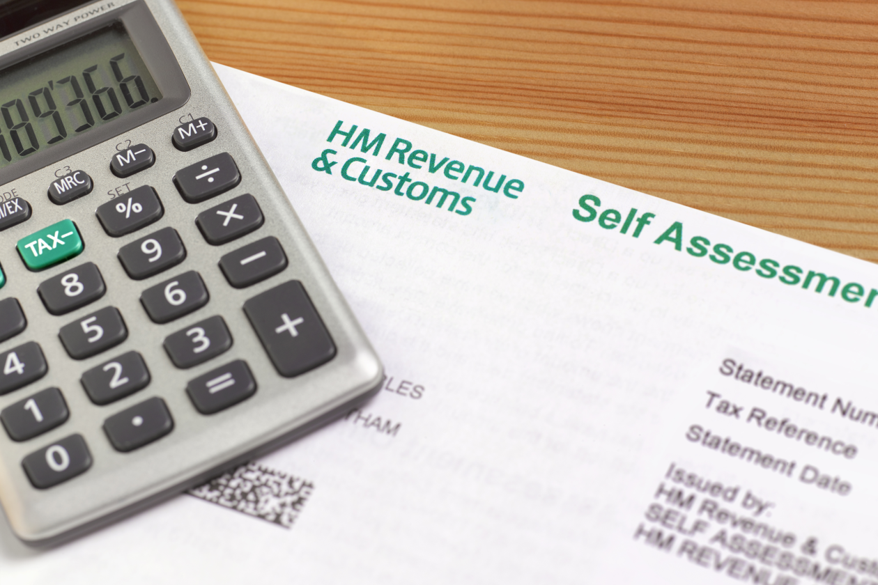 Image of HMRC form and a calculator.png