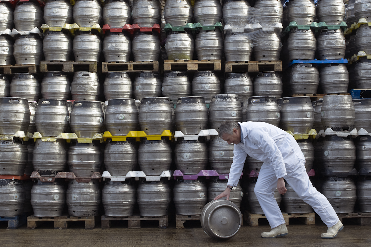 Brewer pushed barrel of beer - AB Inbev