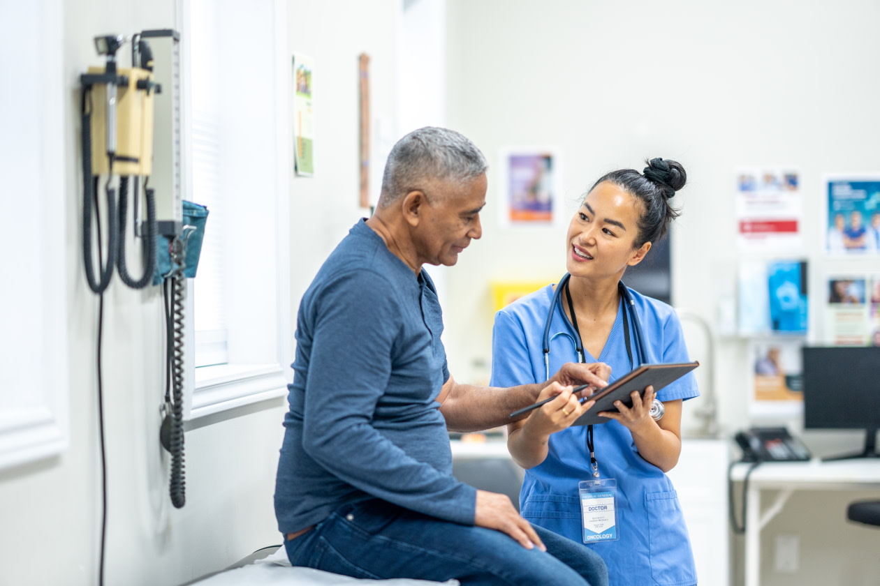 Man having a checkup with his doctor.jpg