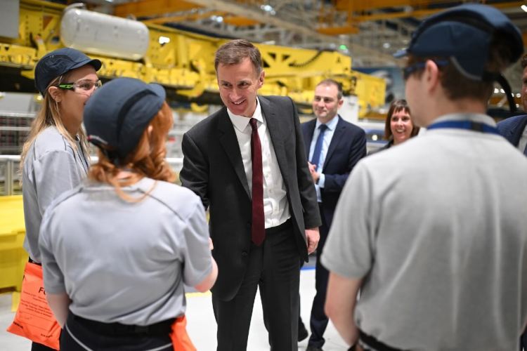 Budget 2024 - Jeremy Hunt visiting workers in a factory