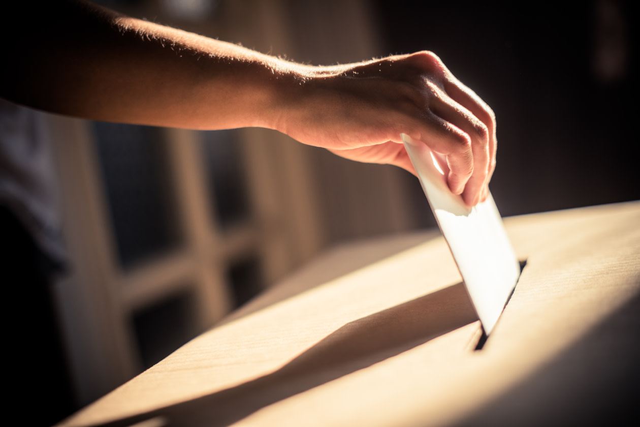 Conceptual image of a person voting during elections- GettyImages
