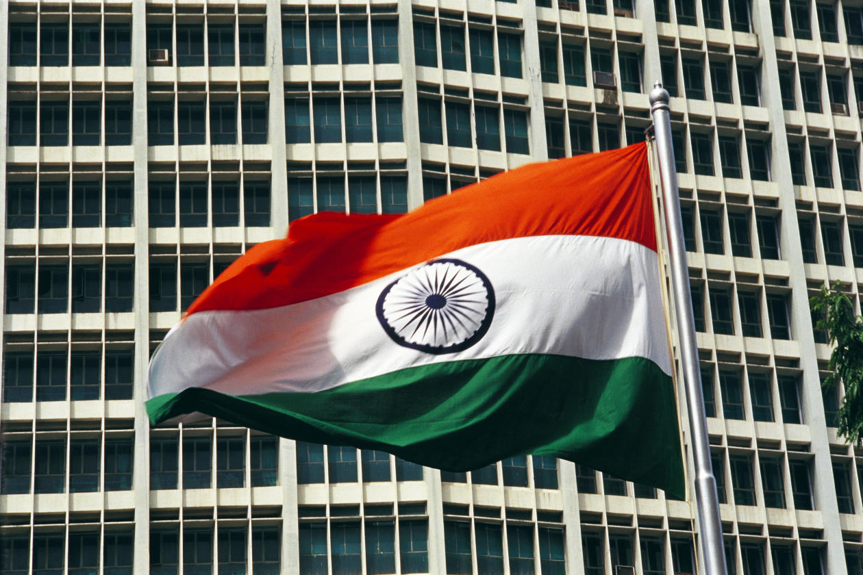 Indian flag flying in front of offices.png
