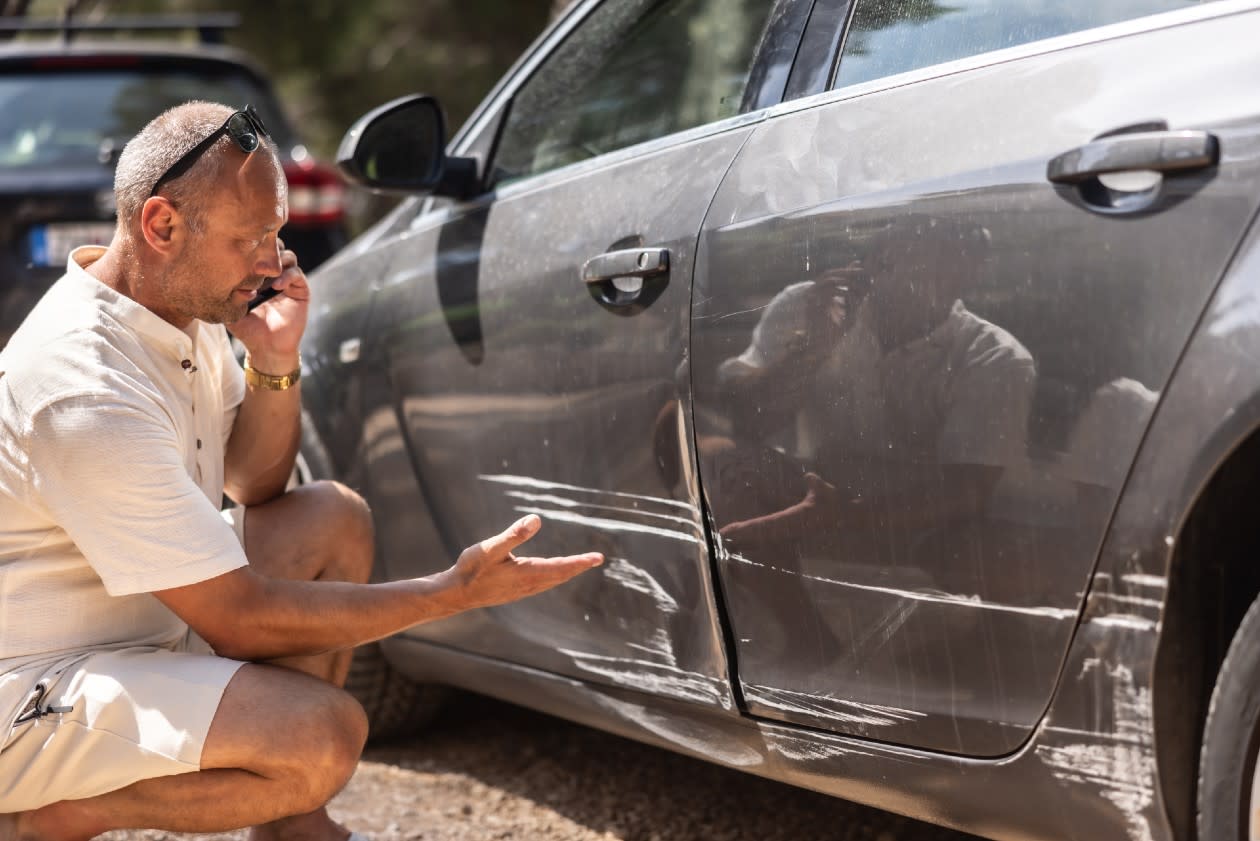 Aviva - man calls insurance company after spotting damage to his car.jpg
