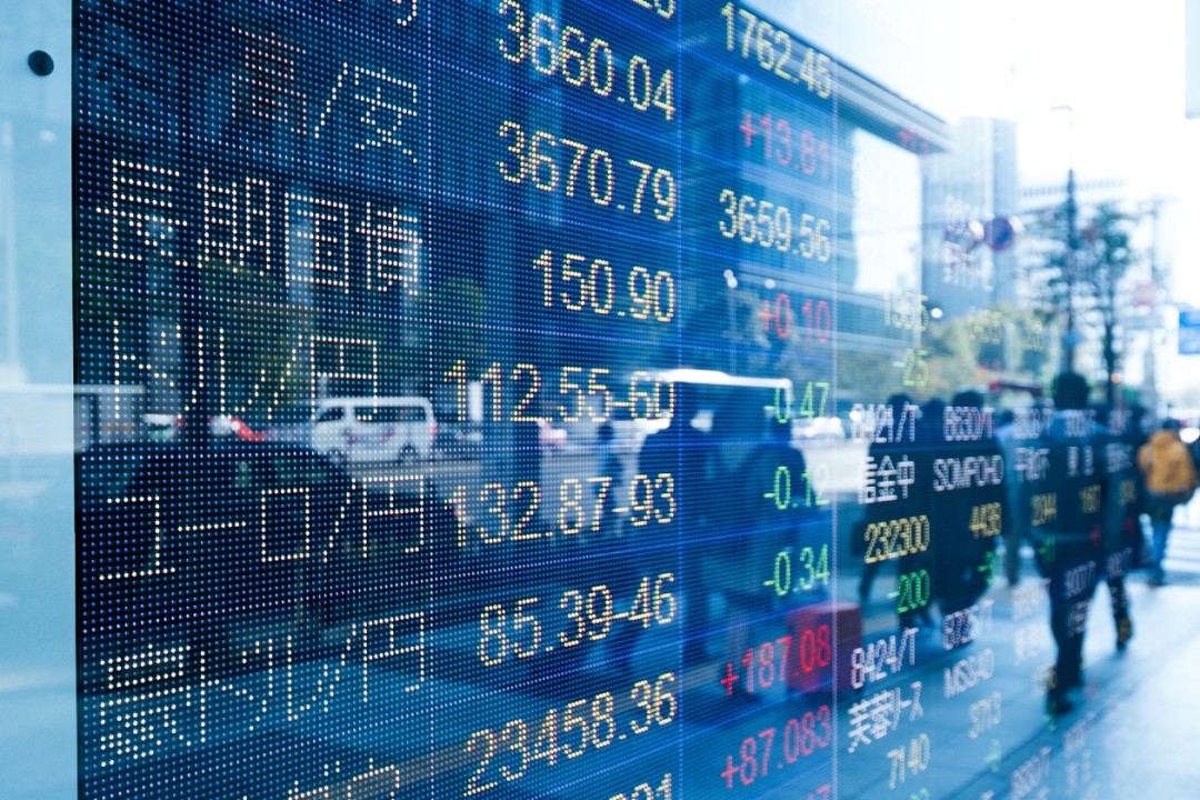 Japanese LED stock market index board facing onto a street.jpg