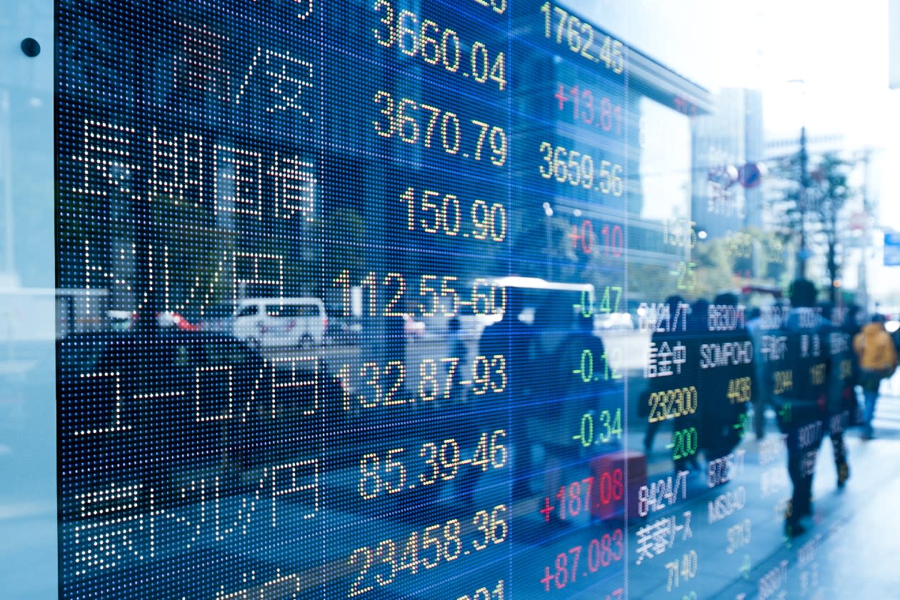 Japanese LED stock market index board facing onto a street.jpg