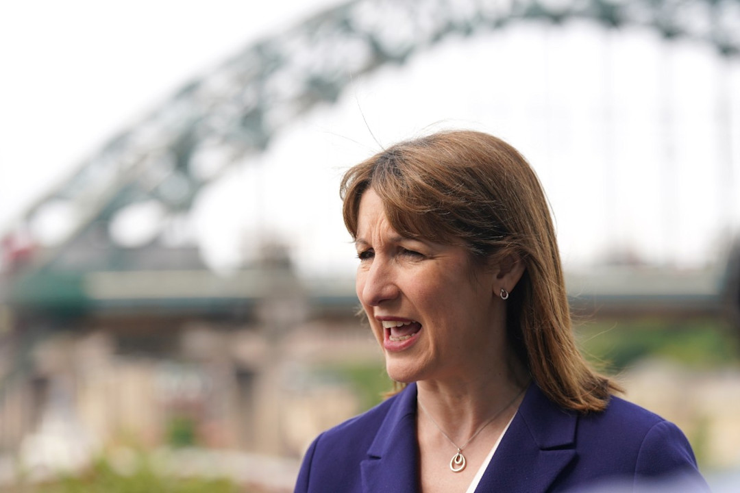 Rachel Reeves speaking to a reporter outside.jpg