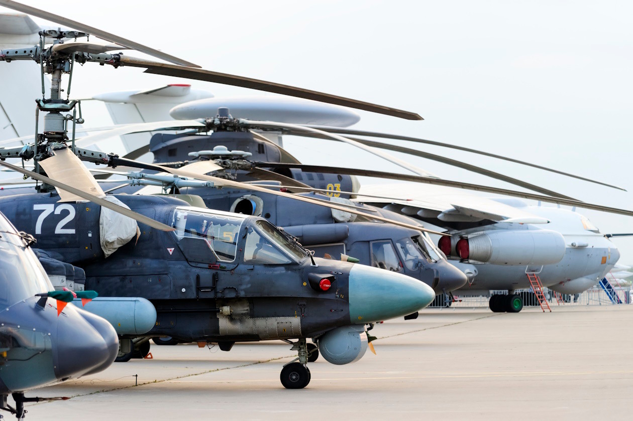 Defence helicopters and planes in a line.jpg