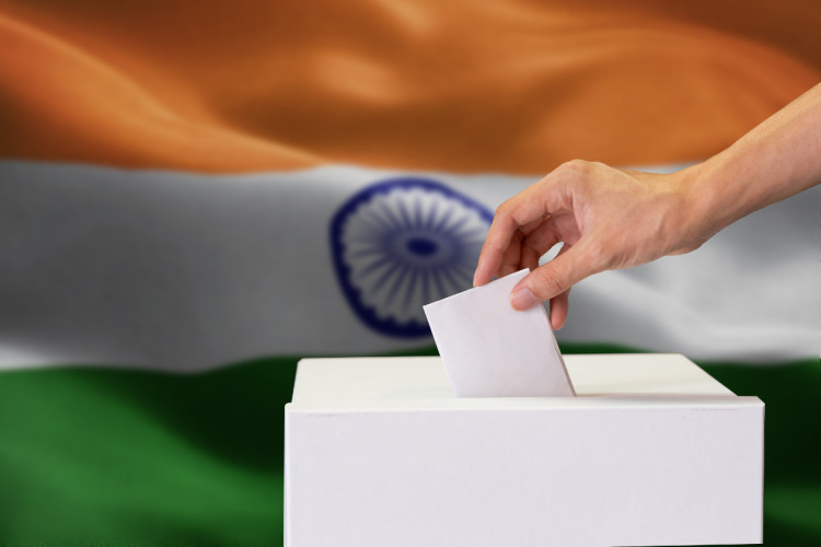 Polling box with India flag blended in background