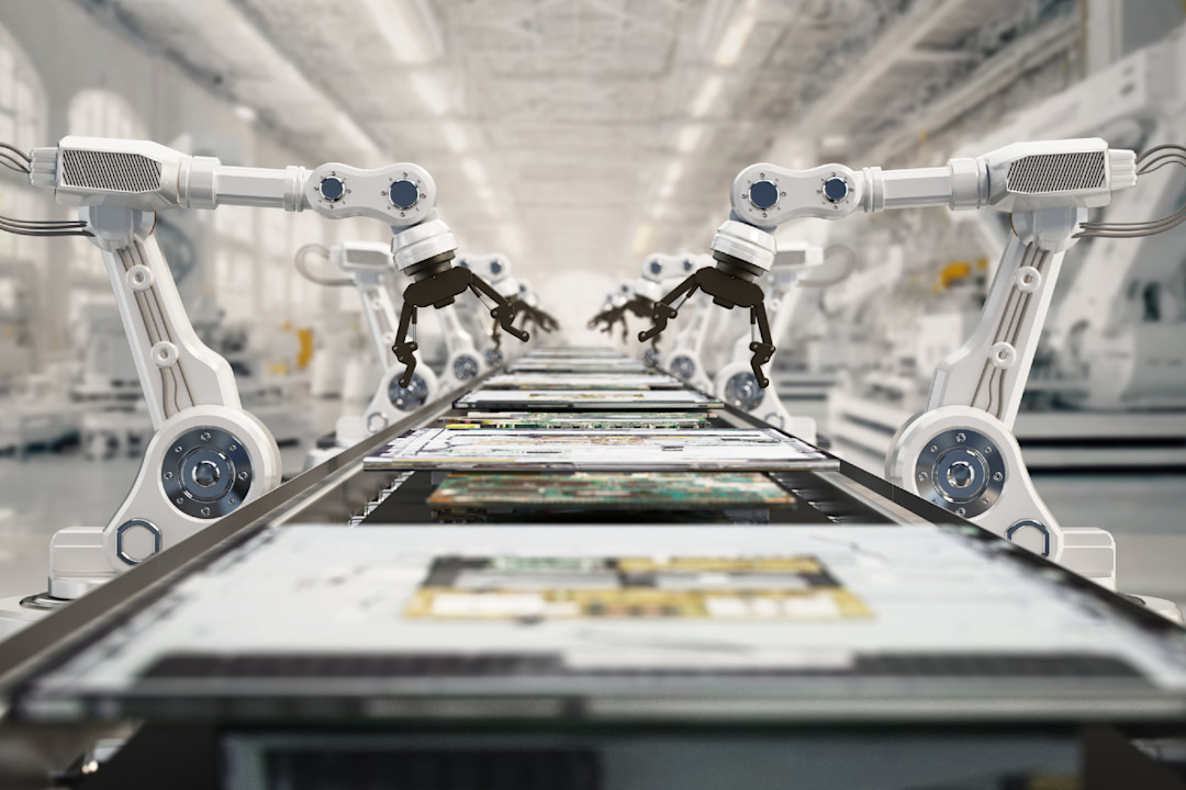 Advanced robotics operates in a high-tech assembly line for electronic devices at a manufacturing facility.jpg